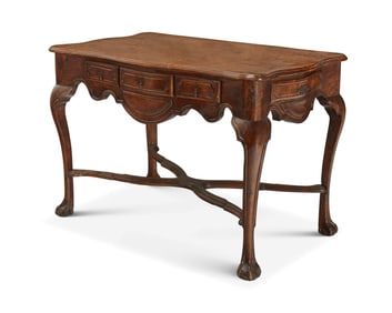 A Continental Rococo-style walnut table