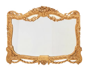 A Napoleon III-style carved giltwood wall mirror