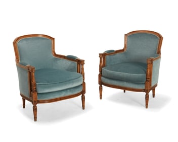 A pair of Louis XVI-style carved wood bergeres