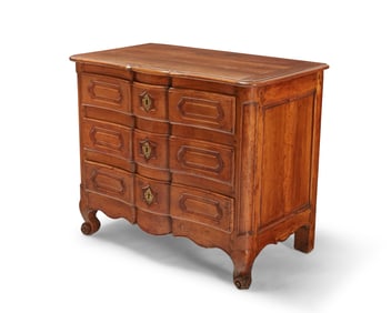 A French Provincial fruitwood commode