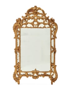A Continental carved giltwood wall mirror