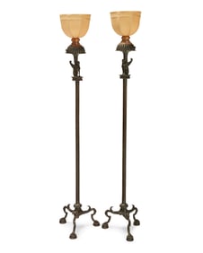 A pair of Neoclassical-style bronze floor lamps