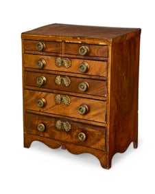 A miniature Federal-style veneered wood chest