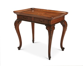 A Louis XV-style walnut table