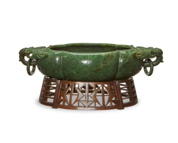 A Chinese carved green jade marriage bowl
