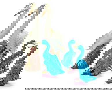 A group of Chinese Export ceramic models of birds: A group of Chinese Export ceramic models of birdsLate 20th centuryEach turquoise variously marked to underside; one impressed: ChinaComprising three turquoise glazed ducks and a pair of cranes depicte