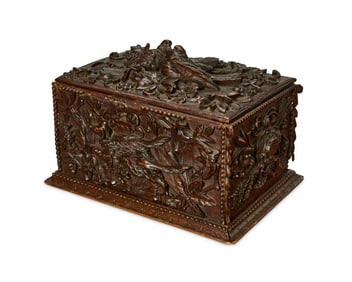 A Black Forest carved wood table box