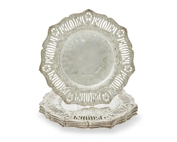 A set of forty-eight Godinger Silver Art Co. silver-plated chargers