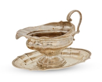 A Buccellati hammered sterling silver sauce boat and underplate