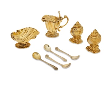 A group of English sterling silver gilt shell-form condiment set