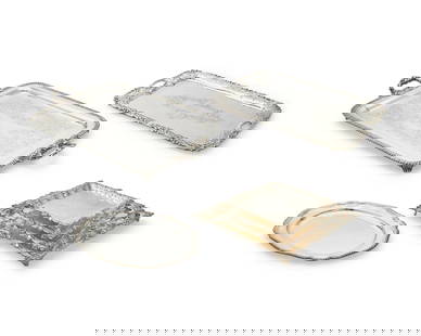 A large group of silver-plated serving trays and dishes: A large group of silver-plated serving trays and dishesLate 19th/20th centuryEach variously markedComprising a group of 3 large silver-plated two-handled rectangular footed serving trays, 5 Sheffield