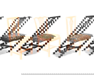 Three George III Provincial carved wood side chairs: Three George III Provincial carved wood side chairs18th/19th centuryEach of various woods and a variation of openwork splat, two with upholstered seatsand one with an upholstered slip seat, each raise