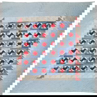 An American patchwork quilt: An American patchwork quiltLate 20th centuryMarked in black pen to one corner verso: TD / 1999Comprising a pieced cotton quilt featuring an all-over "Square in a Square" pattern in floral, striped, an