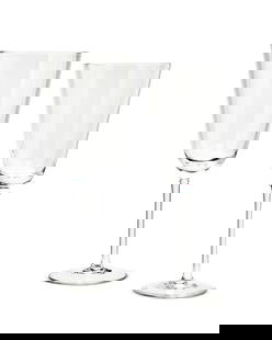 A Richard Ginori glass stemware service: A Richard Ginori glass stemware serviceLate 20th/early 21st century; ItalyComprising sixteen 9" red wine glasses and seventeen 8" white wine glasses33 piecesProvenance:From the Collection of Robert A.