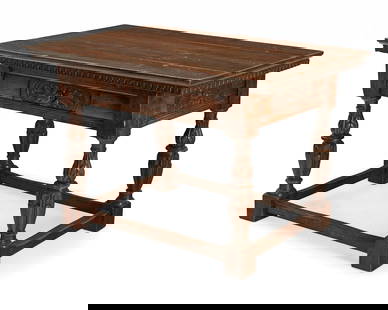 An Italian walnut library table: An Italian walnut library table18th/19th century with later alterationsThe single-drawer table with egg and dart trim, raised on leaf-carved and turned legs joined by stout stretchers32" H x 48" W x 3
