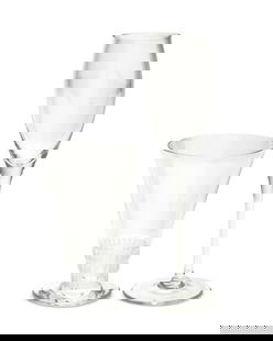 Two sets of Contemporary glassware: Two sets of Contemporary glasswareLate 20th/early 21st centurySix etched: Lalique trademarked France [post-1978]; five etched: CartierComprising a set of six Lalique clear and frosted glass flared foo