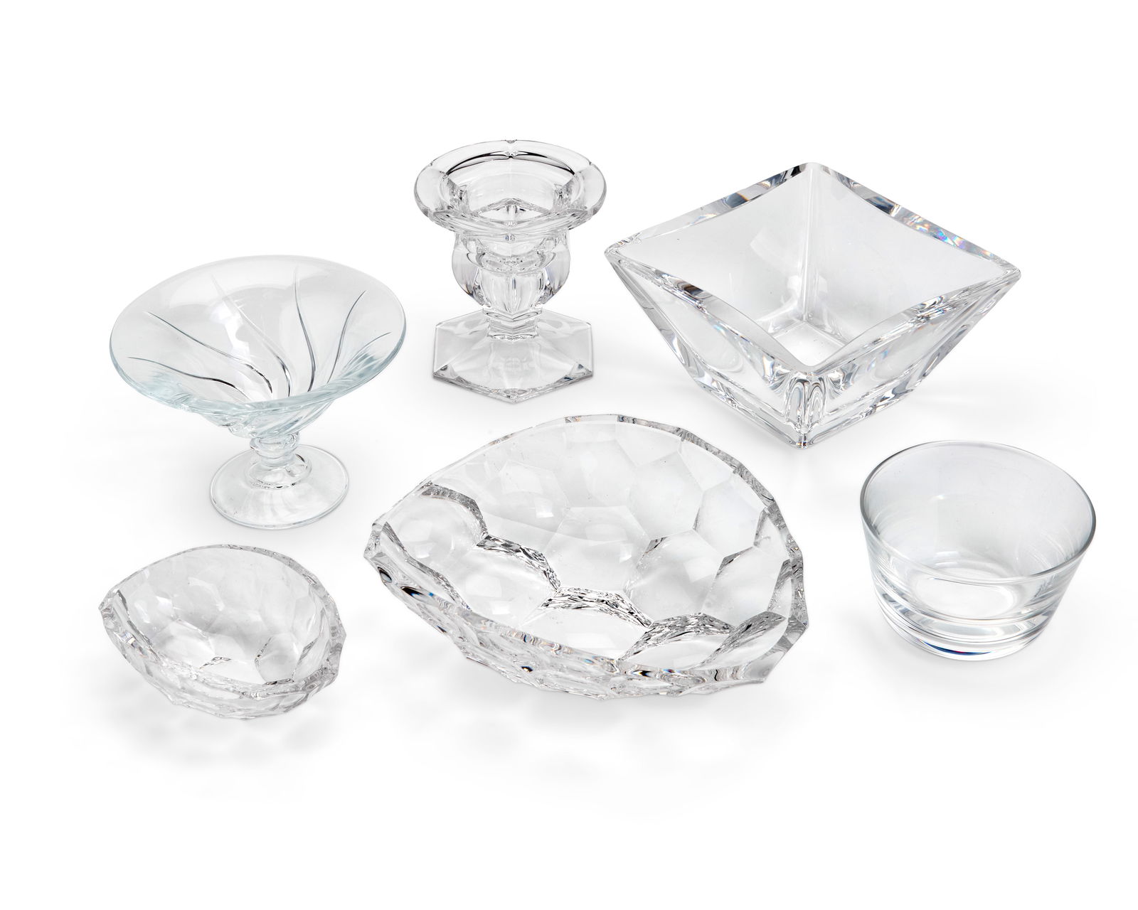 A group of Contemporary glass table items: A group of Contemporary glass table itemsLate 20th/early 21st centuryThree etched: Steuben; square bowl etched: Kosta Boda / 57847 / [signed indistinctly]; candle holder with Royal Doulton factory ste