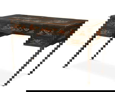 A Regency-style black and gilt japanned wood desk: A Regency-style black and gilt japanned wood deskEarly/mid-20th centuryFitted with five drawers, each drawer interior with later moire lining, featuring gilt Chinoiserie village scenes with figures, r