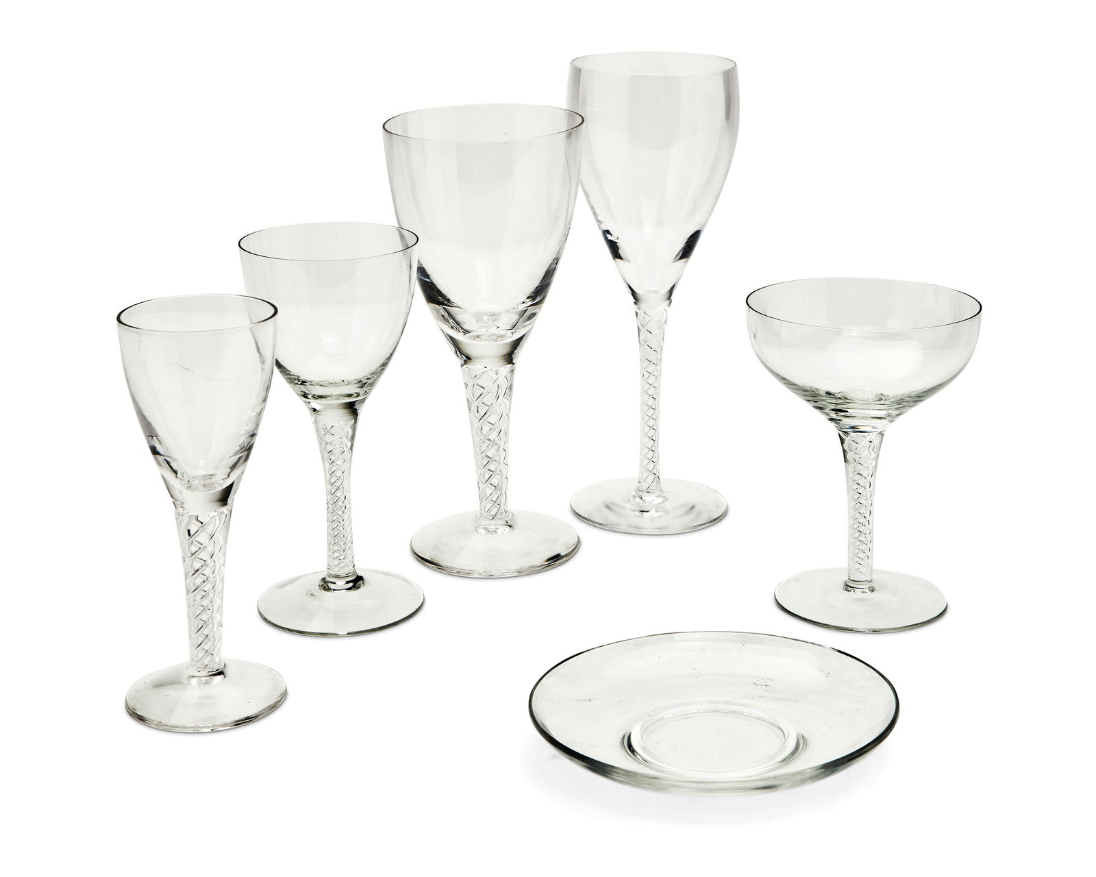 A group of Steuben-style glassware: A group of Steuben-style glasswareLate 20th centurySome variously etched: Stuart / Stuart EnglandEach with air twist stems including wine glasses of various sizes, champagne saucers, and one plate23 p