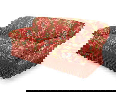 A Contemporary upholstered sofa: A Contemporary upholstered sofaLate 20th centuryThe two-seater sofa upholstered in a floral pattern fabric on burgundy ground above a passementerie apron36" H x 81" W x 42" D Provenance:From the Colle