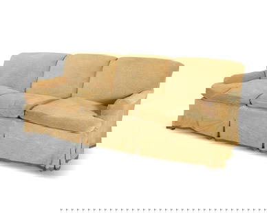 A Contemporary upholstered sofa: A Contemporary upholstered sofaLate 20th/early 21st centuryThe three-seater sofa with gold-toned fabric upholstery37" H x 97" W x 41" D Provenance:From the Collection of Robert A. Day