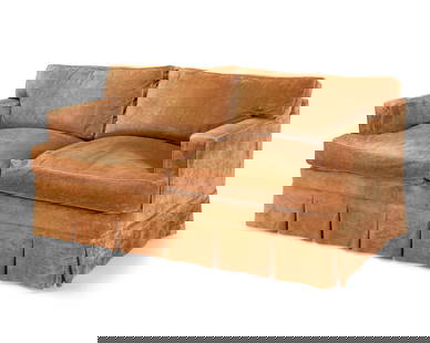 A Contemporary brown velour upholstered sofa: A Contemporary brown velour upholstered sofaLate 20th centuryThe two-seater sofa with pleated apron30" H x 67" W x 40" D Provenance:From the Collection of Robert A. Day