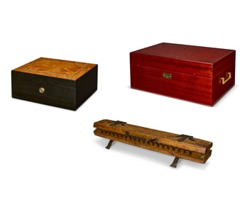 A Hart & Hertel iron and wood cigar press and two humidors