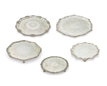 A group of silver-plated trays and platters