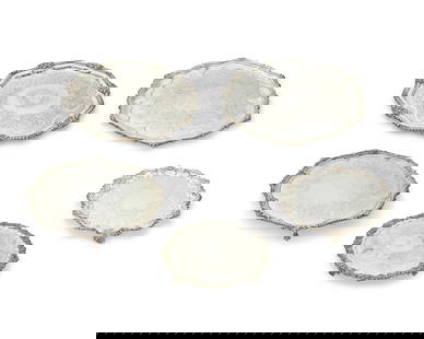 A group of silver-plated trays and platters: A group of silver-plated trays and platters19th/20th centurySome variously marked for makerComprising two round footed serving trays with gadrooned rims, three other large round serving trays, six ova