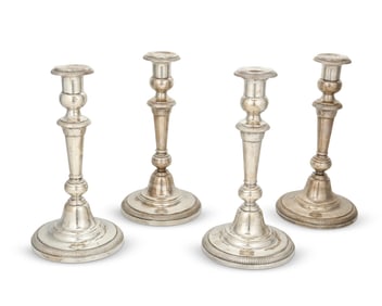 Two pairs of American sterling silver weighted candlesticks