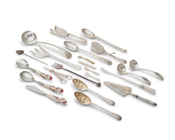 A large group of silver-plated part flatware services and serving utensils
