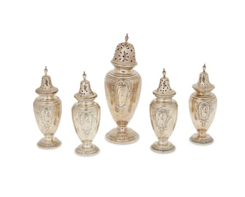 A set of Gorham sterling silver salt and pepper shakers and sugar caster