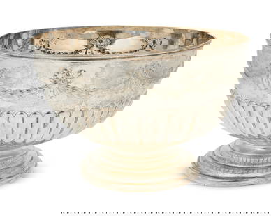 A Victorian sterling silver punch bowl: A Victorian sterling silver punch bowl1890Marked for sterling, for London, date, and maker: WBJ [Walter & John Barnard]The footed bowl with gadrooned body and repousse swags of garlands with ribbons7.