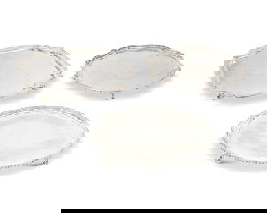 Three English sterling silver footed trays: Three English sterling silver footed trays1940 and 1964Each with British hallmarks for sterling, Sheffield, and date; circular maker: CJV [C J Vander Ltd]; further marked: Harrods; shaped octagonal ma