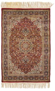 A Qom rug: A Qom rugMid-20th centuryWool on silk foundation6' 1" L x 4" W