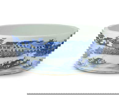 A Chinese blue and white porcelain basin: A Chinese blue and white porcelain basin19th century or laterTThe wide bowl exterior depicting Hongs trading houses on the Pearl River, Canton and merchants in boats, the interior with a building in f