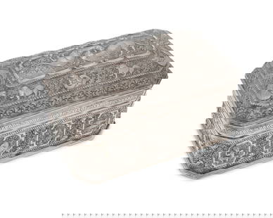 A Burmese sterling silver betel nut box: A Burmese sterling silver betel nut box20th centuryAppears unmarkedThe rectangular vessel with elaborate chased and repousse scrolling vine motif surrounding cartouches of various animals and dancing