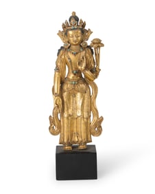 A gilt-metal figure of Padmapani