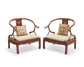 A pair of Chinese horseshoe armchairs