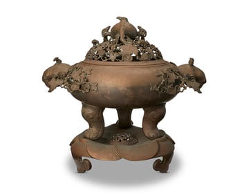 A large Chinese bronze figural censer