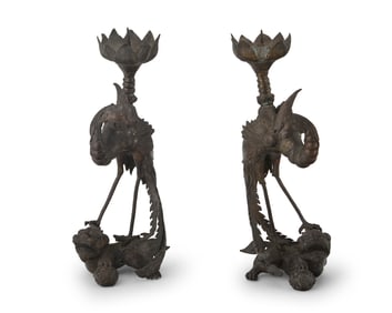 A pair of Chinese bronze phoenix candlesticks