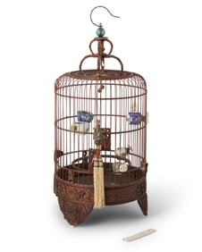 A Chinese carved wood bird cage