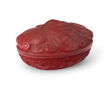 A Chinese cinnabar-style lidded box