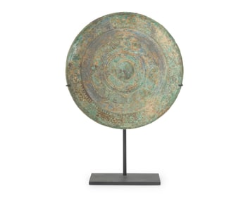 A Chinese bronze mirror