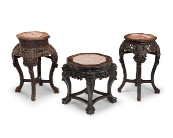 Three Chinese carved wood and marble plant stands