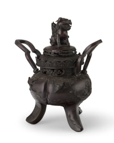 A Japanese bronze figural censer