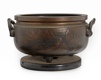 A large Japanese bronze planter