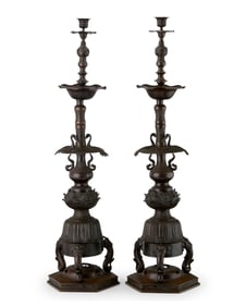 A pair of Japanese bronze candlesticks