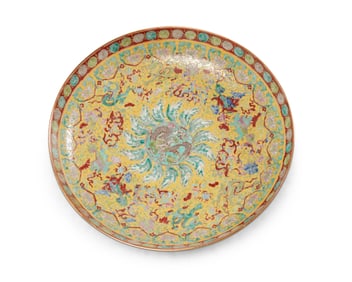 A Chinese yellow ground enameled porcelain charger
