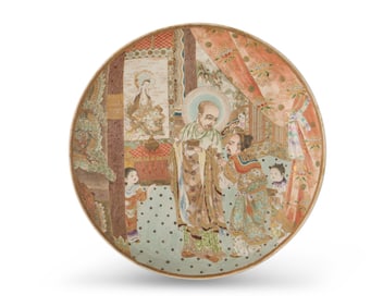 A Japanese Satsuma pottery charger